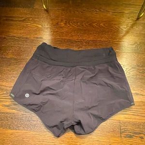 Lululemon black running shorts; size 4
Material is polyester and elastane